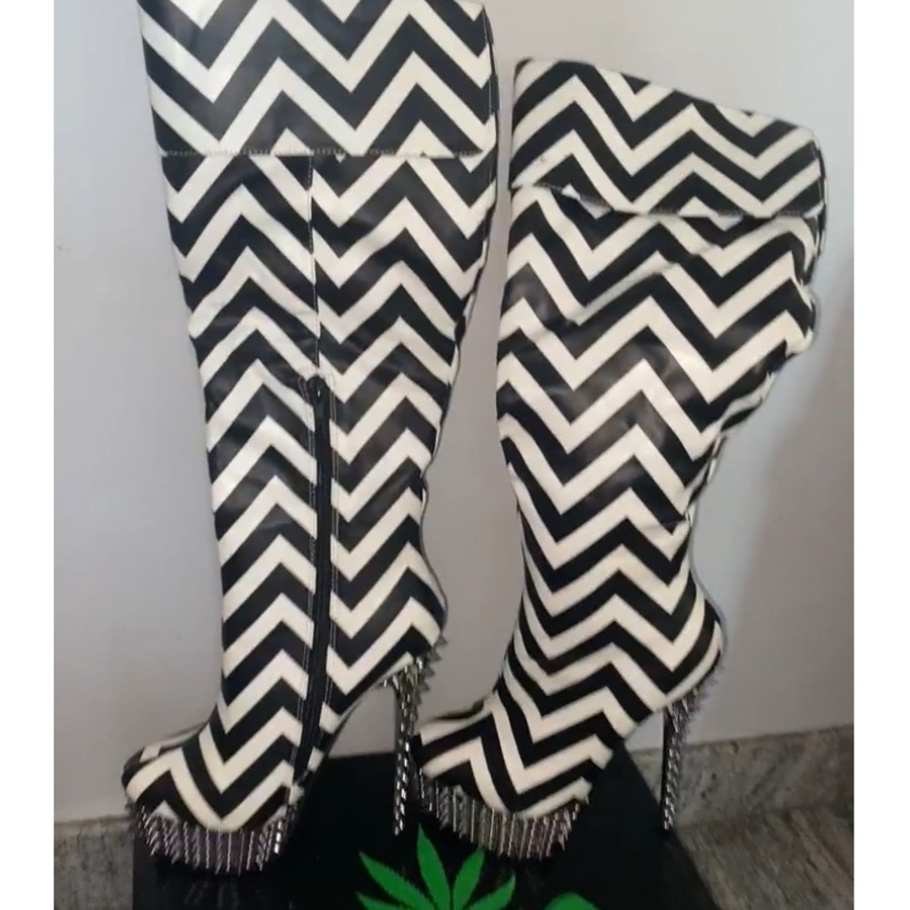 Platform stripe boots with spikes on heels